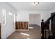 Entryway boasting wood-look floors, natural light, and a staircase with black banister at 5050 Brownwood Dr, Powder Springs, GA 30127