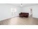 Bright living room offering comfortable seating and direct access to an outdoor deck, perfect for relaxation at 5050 Brownwood Dr, Powder Springs, GA 30127