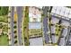 Aerial perspective shows the property layout, highlighting lush landscaping and convenient parking at 102 Grand Cres, Alpharetta, GA 30009