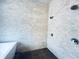 Modern bathroom featuring a luxurious marble tiled shower and multiple shower heads at 102 Grand Cres, Alpharetta, GA 30009