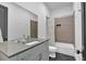 Clean bathroom featuring a single sink vanity with modern finishes and neutral colored shower at 102 Grand Cres, Alpharetta, GA 30009