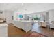 Open concept kitchen featuring a large island, and sliding doors to the backyard at 102 Grand Cres, Alpharetta, GA 30009