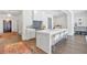 Stylish kitchen with a large center island, breakfast bar, and open layout at 102 Grand Cres, Alpharetta, GA 30009
