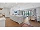 Bright, open-concept kitchen and living area with sleek design and modern appliances at 102 Grand Cres, Alpharetta, GA 30009