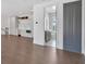 Open living space with hardwood floors and access to a modern bathroom at 102 Grand Cres, Alpharetta, GA 30009