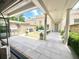 Luxurious outdoor patio with a full kitchen, fire pit and lounge area, perfect for entertaining guests at 102 Grand Cres, Alpharetta, GA 30009