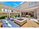 Inviting outdoor patio with a modern fire pit and stylish seating, seamlessly connected to the indoor living space at 102 Grand Cres, Alpharetta, GA 30009