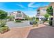 Scenic street view with attractive commercial buildings, a circular driveway, and landscaped median at 102 Grand Cres, Alpharetta, GA 30009