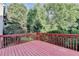 This is the back deck with trees in the back at 1301 Dayspring Trce, Lawrenceville, GA 30045
