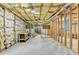Unfinished basement area with exposed ceiling and framing at 1301 Dayspring Trce, Lawrenceville, GA 30045
