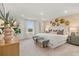 Serene main bedroom with neutral tones, plush carpet, and abundant natural light, creating a relaxing retreat at 216 Paisley Way, Locust Grove, GA 30248