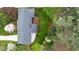 Aerial view of a well-maintained home surrounded by mature trees and landscaping at 3755 Kayanne Ct, Tucker, GA 30084