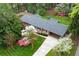 Inviting single-story brick home featuring a well-maintained yard with colorful flowering trees at 3755 Kayanne Ct, Tucker, GA 30084