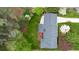 Aerial view of a single Gathering home with a new roof and sprawling backyard featuring mature landscaping at 3755 Kayanne Ct, Tucker, GA 30084