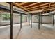 Unfinished basement with concrete floor and block walls; great potential for customization at 3755 Kayanne Ct, Tucker, GA 30084