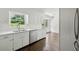 Well-appointed kitchen with white cabinets, subway tile backsplash and stainless steel appliances at 3755 Kayanne Ct, Tucker, GA 30084