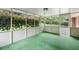 Enclosed sun room with glass windows and a screen door for enhanced outdoor living at 3755 Kayanne Ct, Tucker, GA 30084