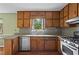 Efficient kitchen featuring wood cabinets, stainless steel appliances and countertop space, great for cooking prep at 140 Carriage Cir, Stockbridge, GA 30281