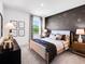 Cozy bedroom with a dark accent wall with equations and patterns and a soft carpet at 330 Meacham Ct, Dacula, GA 30019