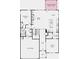 Layout of the first floor featuring a bedroom suite, kitchen, great room, dining room, foyer, and two-car garage at 330 Meacham Ct, Dacula, GA 30019