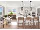 Open-concept kitchen featuring a large island, modern appliances, and ample cabinet space perfect for entertaining at 330 Meacham Ct, Dacula, GA 30019