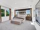Spacious main bedroom with tray ceilings, soft carpet, and ample natural light at 330 Meacham Ct, Dacula, GA 30019