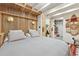 Comfortable bedroom boasts stylish wooden accents, ambient lighting, and storage access at 3620 Beaver Cove Rd, Cumming, GA 30041