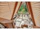 A-frame living space with expansive windows offering views of the trees and outdoors at 3620 Beaver Cove Rd, Cumming, GA 30041