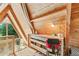 Bright loft with wood paneling, a desk, natural light, and tranquil views at 3620 Beaver Cove Rd, Cumming, GA 30041