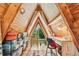 Charming loft space with a pitched ceiling, natural light, and a cozy atmosphere at 3620 Beaver Cove Rd, Cumming, GA 30041