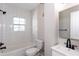 Clean bathroom featuring new fixtures, tile and a bathtub at 469 Mellview Sw Ave, Atlanta, GA 30310