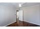 This bedroom has hardwood floors, ceiling fan, and neutral walls at 469 Mellview Sw Ave, Atlanta, GA 30310