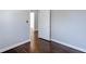 This bedroom has neutral walls, hardwood floors, and white trim at 469 Mellview Sw Ave, Atlanta, GA 30310