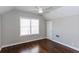 Bedroom featuring neutral paint, ceiling fan, and hardwood floors at 469 Mellview Sw Ave, Atlanta, GA 30310