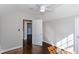 Bedroom featuring hardwood floors, closet and ensuite access at 469 Mellview Sw Ave, Atlanta, GA 30310