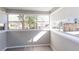 This sunroom has natural light and updated windows at 469 Mellview Sw Ave, Atlanta, GA 30310