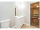 Bathroom featuring a white vanity, sink, and mirror, conveniently located near the bedroom at 5354 Cherry Wood Drive Dr, Stone Mountain, GA 30083