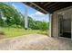 Beautiful back patio overlooks a private backyard and lush landscaping at 2111 Bellrick Nw Rd, Atlanta, GA 30318