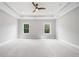 Spacious bedroom featuring neutral carpet, recessed lighting, ceiling fan, and natural light at 2111 Bellrick Nw Rd, Atlanta, GA 30318