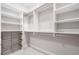 Spacious closet with white shelving and wire storage baskets at 2111 Bellrick Nw Rd, Atlanta, GA 30318