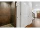 Hallway view with elevator and view of the staircase and front entrance at 2111 Bellrick Nw Rd, Atlanta, GA 30318