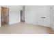 Bright bedroom with hardwood floors, white walls, and black hardware on the doors at 2808 Hosea L Williams Dr, Atlanta, GA 30317