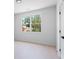 Bright bedroom features a large window overlooking mature trees and offers ample natural light at 2808 Hosea L Williams Dr, Atlanta, GA 30317
