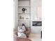 Close-up of modern living room featuring shelving, fireplace, and stylish furniture at 2808 Hosea L Williams Dr, Atlanta, GA 30317
