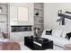 Modern living room featuring sleek fireplace, stylish decor, and cozy furniture at 2808 Hosea L Williams Dr, Atlanta, GA 30317