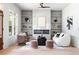 Bright and airy living room with modern fireplace and built in shelving at 2808 Hosea L Williams Dr, Atlanta, GA 30317