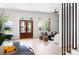 Bright living room with hardwood floors and a view of the front door and exterior at 2808 Hosea L Williams Dr, Atlanta, GA 30317