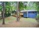 Spacious backyard featuring a play area and mature trees at 3076 Montheath Pass, Duluth, GA 30096