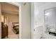 Ensuite bathroom is conveniently located off of this cozy bedroom with carpeted floors at 3076 Montheath Pass, Duluth, GA 30096