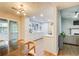Open floor plan with a view from the dining area to the kitchen and living room at 3076 Montheath Pass, Duluth, GA 30096